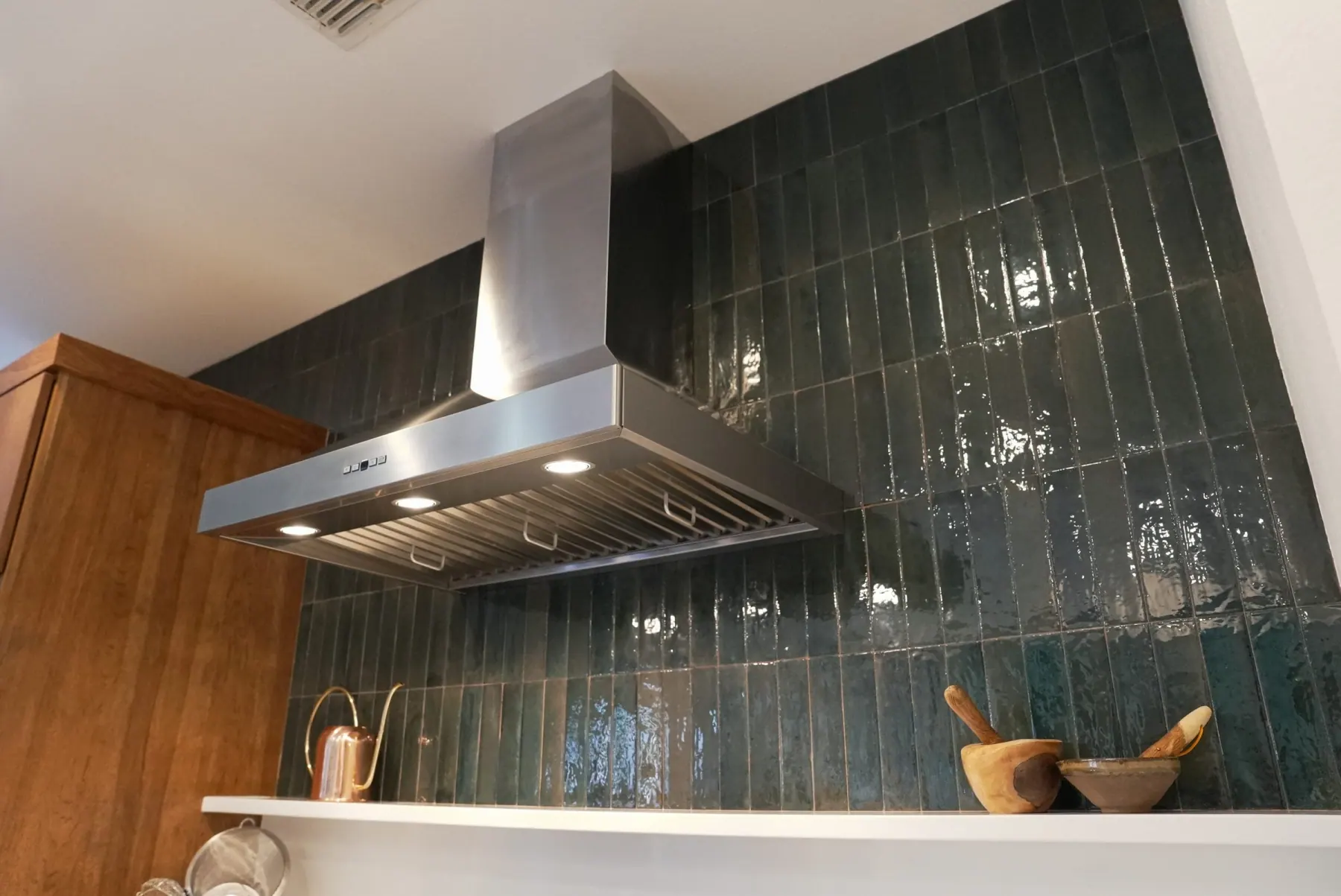 Warm Wood Kitchen With Green Tile And White Counters Kitchen Remodel in Austin, TX by ATX Renovations project photo 11