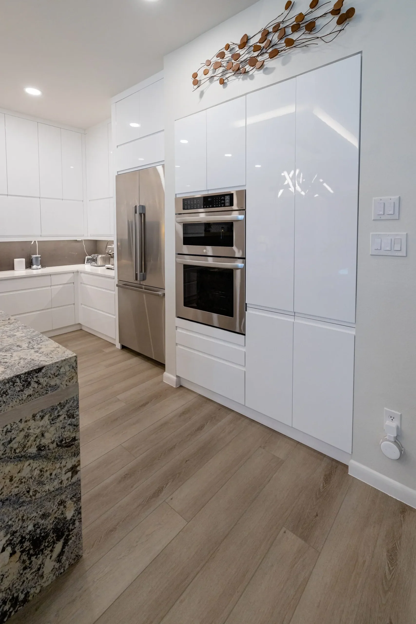 Waterfall island kitchen remodel by ATX Renovations in Bee Cave, TX