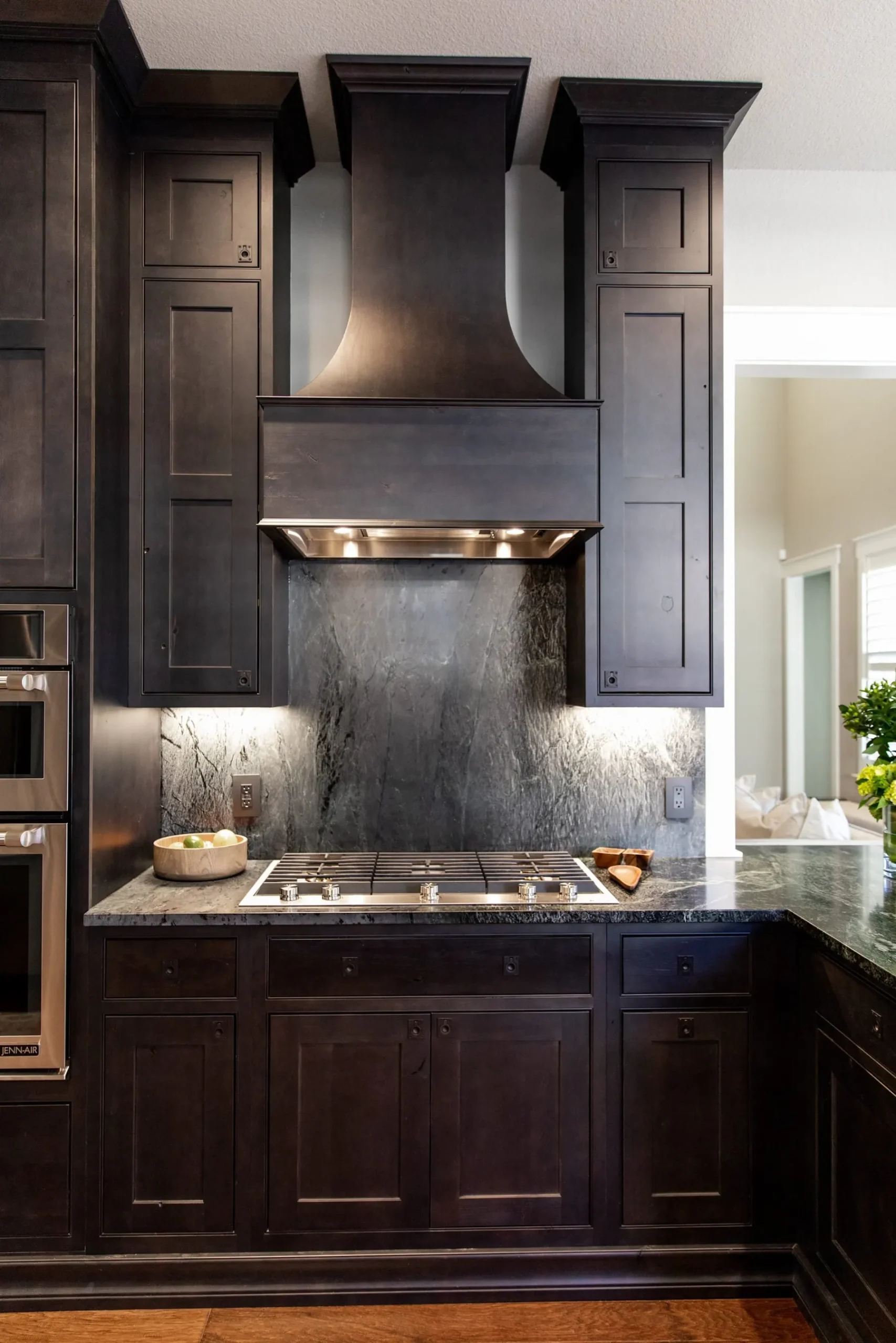 Dark stone kitchen remodel by ATX Renovations in Westlake, Austin, TX
